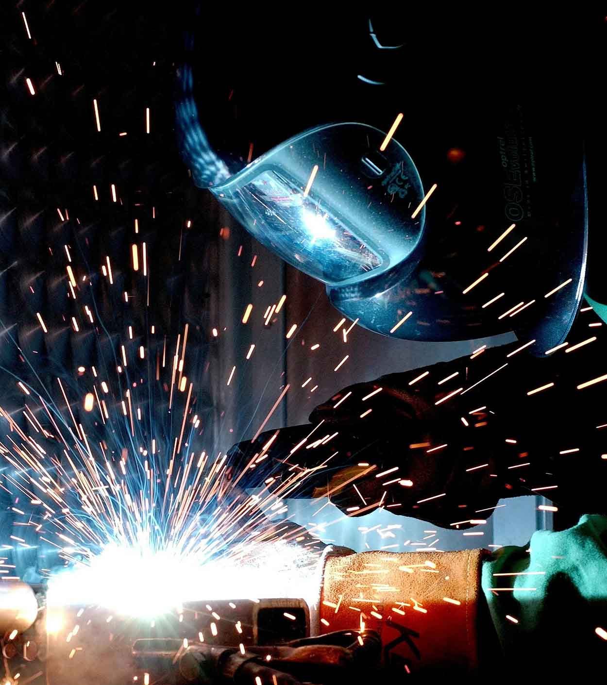 Welding sparks representing industrial innovation